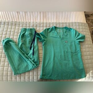 Figs surgical green scrub top and high waisted jogger bottom